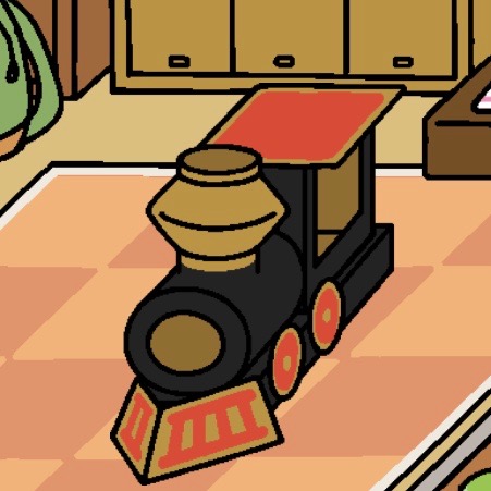 A large train that is made of cardboard and can hold more than one cat at a time is currently empty. It is shaped like an old steam engine.
