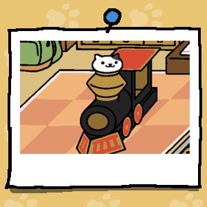 Spots is a white cat with a large black spot over one ear. Spots is looking out of the smokestack of the cardboard train.
