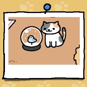 Patsy is a white cat with some grey spots and some light orange spots. Patsy looks at the snow dome.