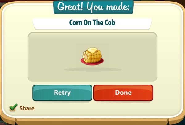 A small corn on the cob with a pat of butter on top of it sits on a red plate