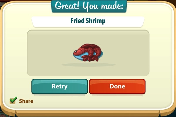 A bright red fried shrimp on a small blue plate