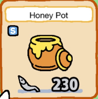 An orange pot of honey is open. The lid is of to the side of the pot. There is a lot of yellow honey on top of the jar and coating some of the jar.