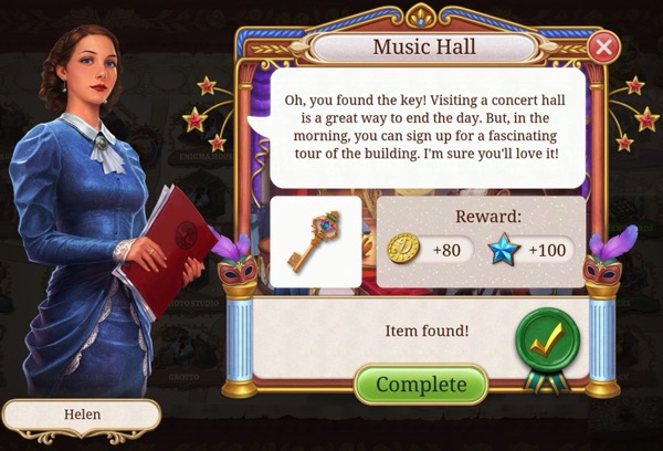 A woman in a blue dress suggests the player visit the Music Hall, now that the key has been located.