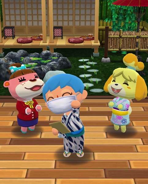 My Pocket Camp character successfully completed Creek Cooldown 2 class. They stand between Lottie and Isabelle. The items for the class are behind them.