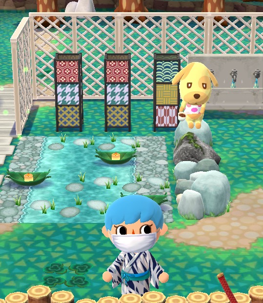 My Pocket Camp character is wearing a kimono with black, white, and grey stripes. Behind her is a flowing river rug that has two bamboo boats with lit candles floating in it. Many stepping stones are in the water. Three lanterns are behind it.