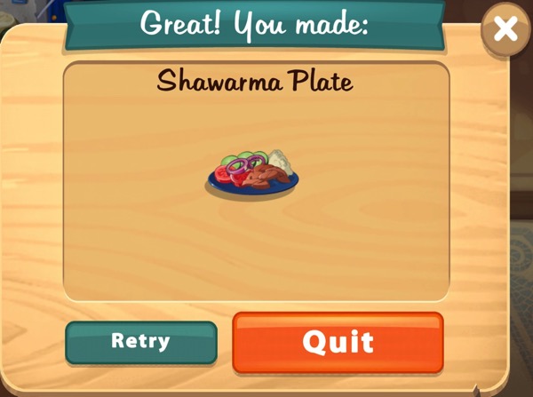 A blue plate is filled with Shwarma, which includes meat, rice, and vegetables.