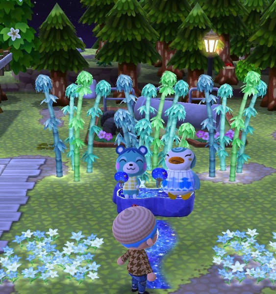 Bluebear and Sprinkle sit next to each other on the Starry Bench. Their eyes are closed, and each one holds up a blue fan with stars on it.