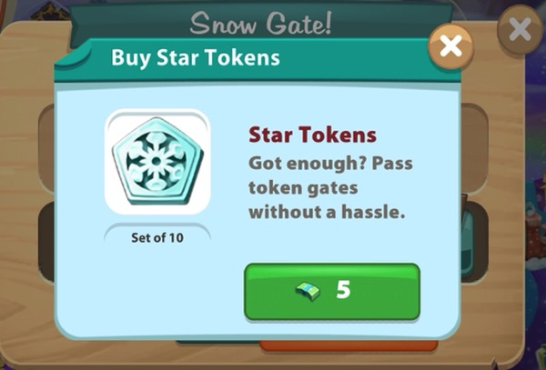 A pop-up shows a box that says "Buy Star Tokens". The Star Tokens look like a snowflake. A player must spend 5 Kitchen Cash to get a set of 20 Star Tokens.