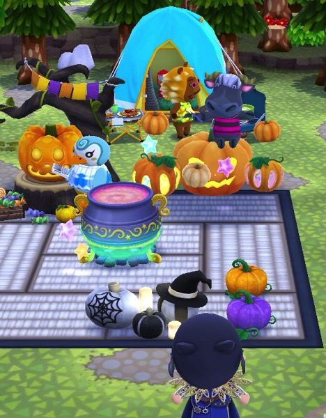 One animal friend is sitting on top of the orange mystic pumpkins. He holds two wands to make the smaller pumpkins levitate.