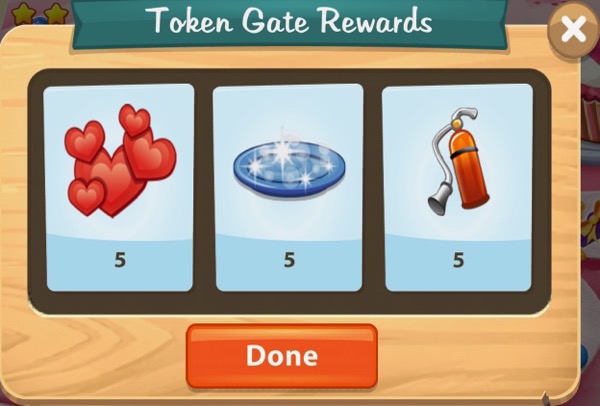 The reward for going through the second Token Gate are 5 Heart Blasts, 5 instant dishes, and 5 fire extinguishers that prevent food from burning.