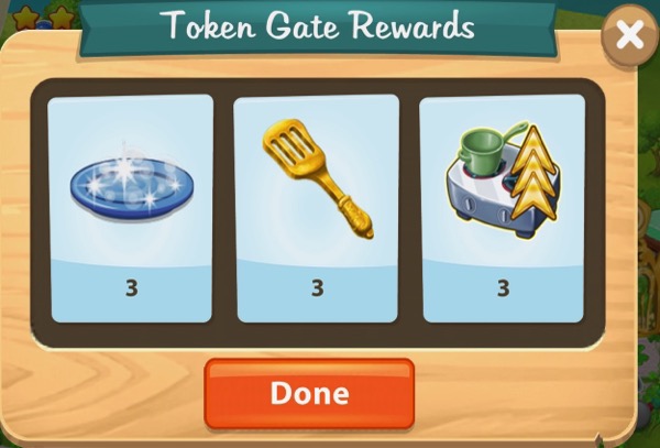 The rewards for going through the first Token gate were special items that help a player make progress in Kitchen Scramble.