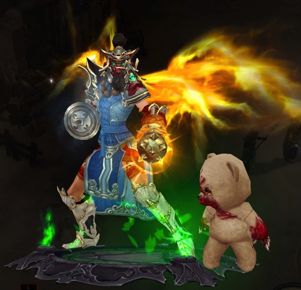 A Monk is wearing some blue armor and some red armor. She carries two fist weapons. She has glowing wings. Next to her is a teddy bear with glass shards for claws who is covered in blood.