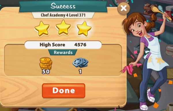Pepper is happy. She holds up two spoons, and holds a pink dishcloth. The box next to her shows three gold stars.