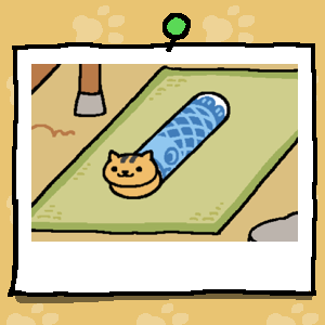 An orange cat with black stripes sticks their head out of the front of the Carp Tunnel.