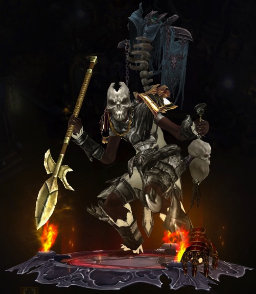 A Witch Doctor is wearing a skull for a helmet, and carries two skulls on a rope in one hand. His other had holds a large spear. He is wearing a banner called Samheim that has a shroud and what looks like a rib cage and spine. The banner has a demon skull on it. The Friendly Gauntlet is near the Witch Doctor's foot.