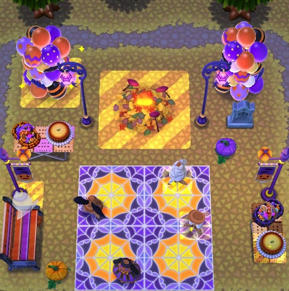 An above view of an outdoor Halloween scene. The highlighted squares show where the player needed to put the items. 