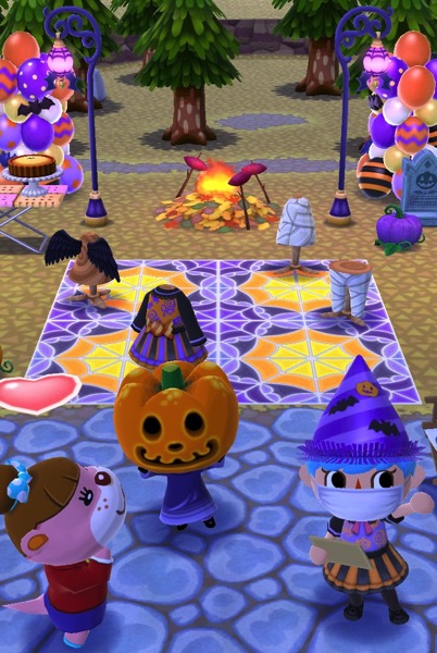 My Pocket Camp character holds a clipboard and looks out at the viewer. Next to her, Jack and Lottie look pleased. 