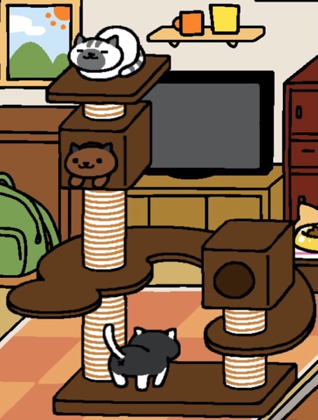 A white cat with grey stripes on their head and tail, and grey spots on their mouth and ears has formed into a loaf and is asleep. Ganache is a brown cat with grey ears who is looking out from inside the box below Melange. Genache's paws stick out. At the bottom of the Cat Metropolis is a Socks, a black cat with white ears, paws, and tail. Socks is facing away from the viewer.