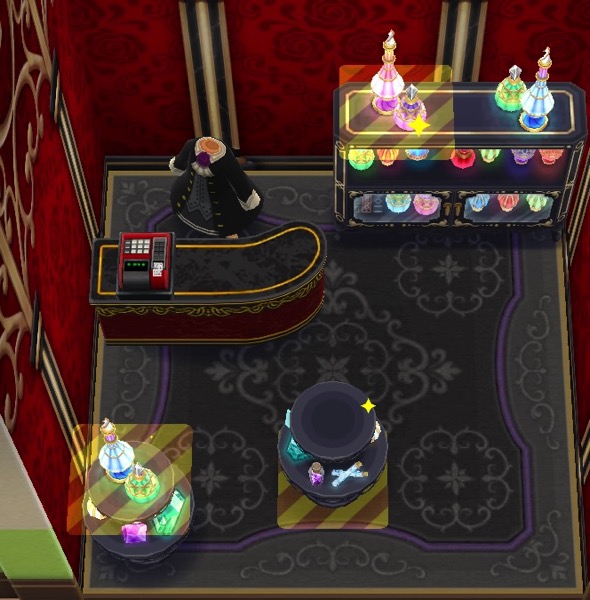 The room has three boxes that highlight where the player needs to put specific items. One is on top of the potions shelf, one is on top of the potion display stand. The other is a second potion display stand.