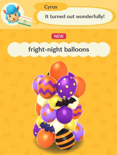 Fright-night balloons are a pile of balloons in purple, orange, yellow, and white. There are a few bat shaped balloons. Some balloons have stripes, or dots, on them. The balloons have been shaped into a one structure, with all the balloons attached to it.