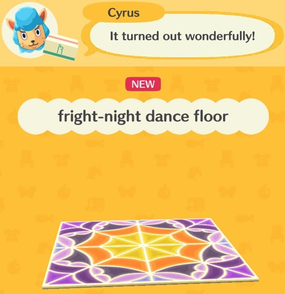 The fright-night dance floor is square. It is segmented into different pieces, turning each side into a triangular shape that connects in the center. The middle looks like a yellow and orange spider web. There are purple designs toward the ends of the dance floor.
