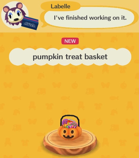 The pumpkin treat basket looks like a plastic Halloween pumpkin with a handle on top of it. The pumpkin is stuffed full of sweets. Players can carry this item around with them.