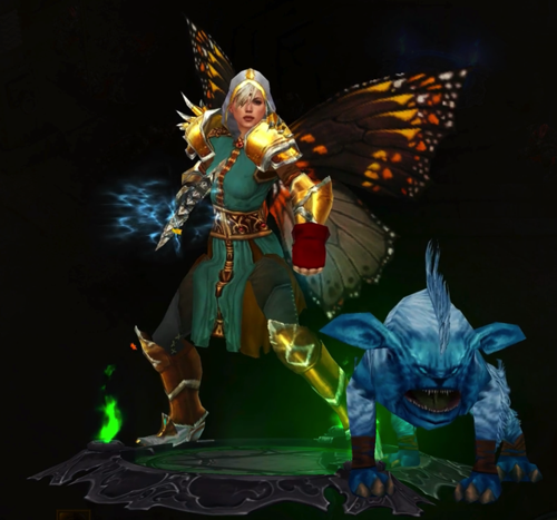 A Monk is wearing butterfly wings on her back. She is wearing four pieces from the "Tyrael" set. She wears a green tunic and black pants. One of her hand weapons is glowing. The other is wrapped in red. Next to he is an undead pug dog.