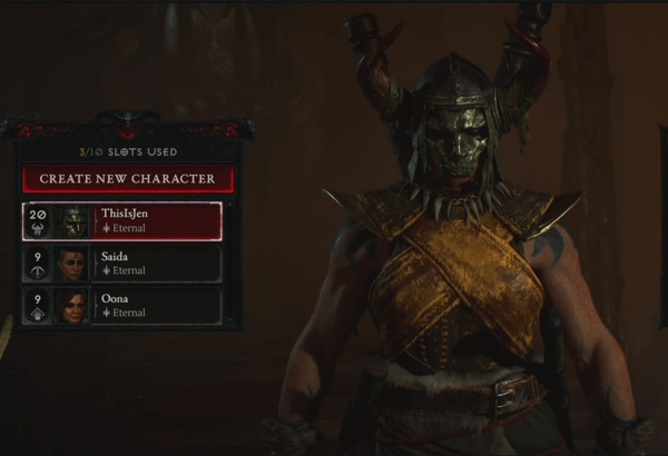 A Barbarian is wearing a horned helmet that covers her face. She is wearing a yellow band across her chest and has metallic shoulders. Some of her tattoos are visible.