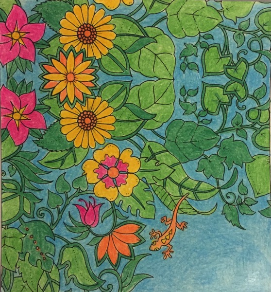 Brightly colored flowers are on the side of this coloring sheet. Some are yellow and orange, and others are pink. Many green leaves fill the rest of the space.