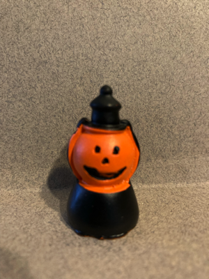 Day Twenty gave me a hard plastic figure that appears to be a lantern that may have been made with an old trick-or-treating bucket.