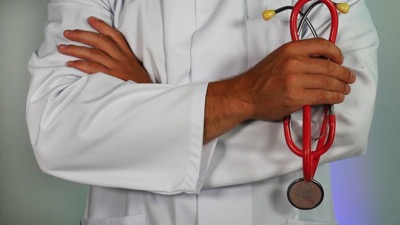 doctor wearing a white coat and holding a stethoscope Online Marketing on Unsplash