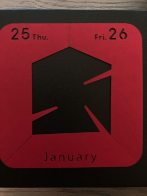 The cutout of January 25 and 26 after it was removed from the calendar.